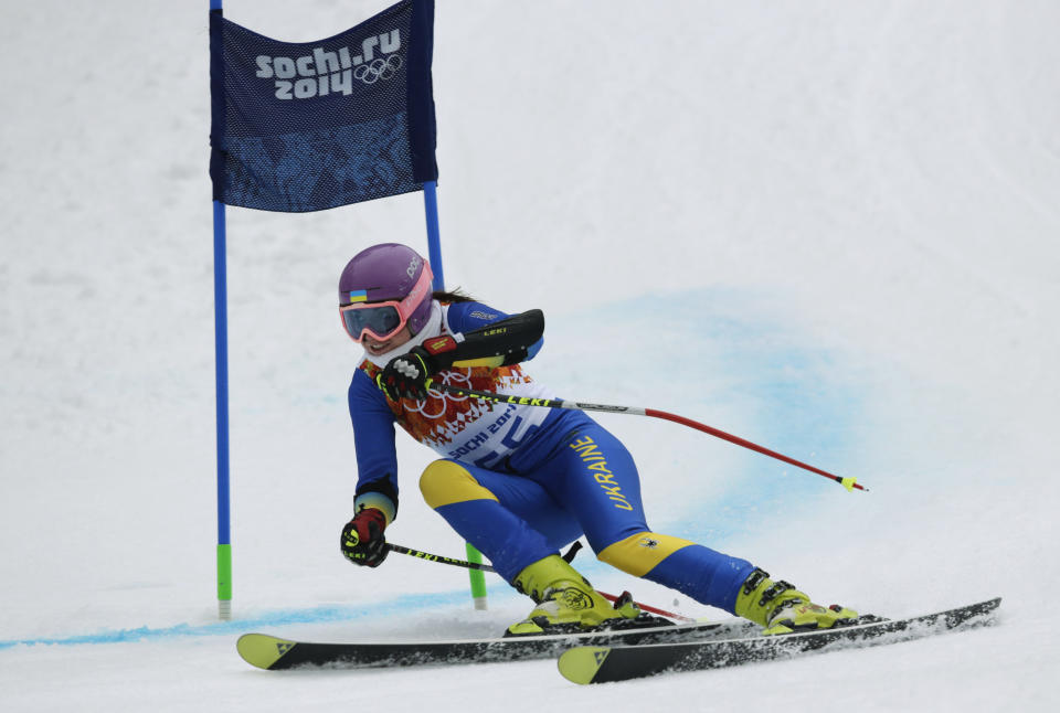 In this Saturday, Feb. 15, 2014 photo, Ukraine's Bogdana Matsotska passes a gate in the women's super-G at the Sochi 2014 Winter Olympics in Krasnaya Polyana, Russia. The International Olympic Committee said on Thursday, Feb. 20, that Matsotska has left the Olympics in response to the violence in her country. (AP Photo/Charles Krupa)