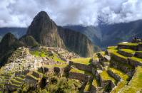 Arriving to Machu Picchu on foot is on many travelers' lists for a reason. But because visiting the site, by trek or otherwise, has become so popular—with the ancient Incan ruins suffering from <a href="https://www.cntraveler.com/story/we-are-not-trampling-machu-picchu-out-of-existence?mbid=synd_yahoo_rss" rel="nofollow noopener" target="_blank" data-ylk="slk:overtourism;elm:context_link;itc:0;sec:content-canvas" class="link ">overtourism</a> in recent years—the Peruvian government has <a href="https://www.cntraveler.com/story/machu-picchus-ticket-policy-explained?mbid=synd_yahoo_rss" rel="nofollow noopener" target="_blank" data-ylk="slk:placed caps;elm:context_link;itc:0;sec:content-canvas" class="link ">placed caps</a> on how many people can visit daily. They've also capped trekker capacity on the historic Inca Trail, a journey that can take anywhere from a couple days, to a week. Book in advance to visit during the dry season (from roughly April to October), which will also help you secure one of just 400 daily tickets to climb up the iconic peak of Huayna Picchu, offering great views over the ruins for a lucky few.