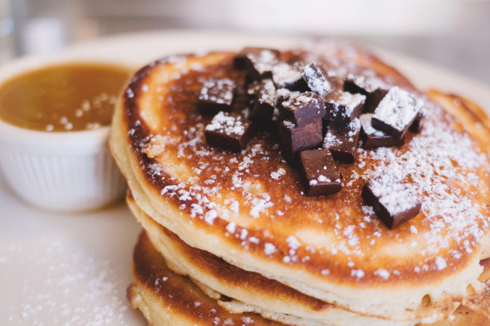 Chocolate chip pancakes with powdered sugar