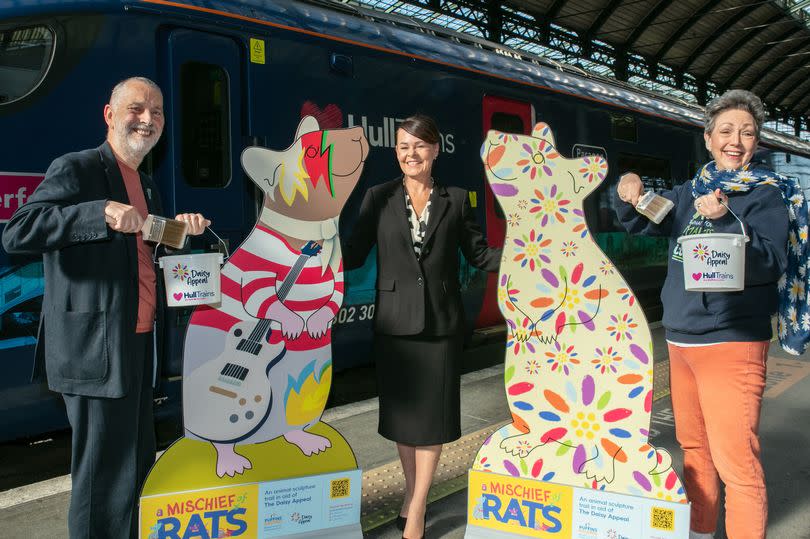 From left, Rick Welton, co-director of A Mischief of Rats; Lou Mendham, service delivery director at Hull Trains, which has partnered with the exhibition, and Claire Levy, fundraising manager for the Daisy Appeal, with mock-ups of how the decorated rats might look