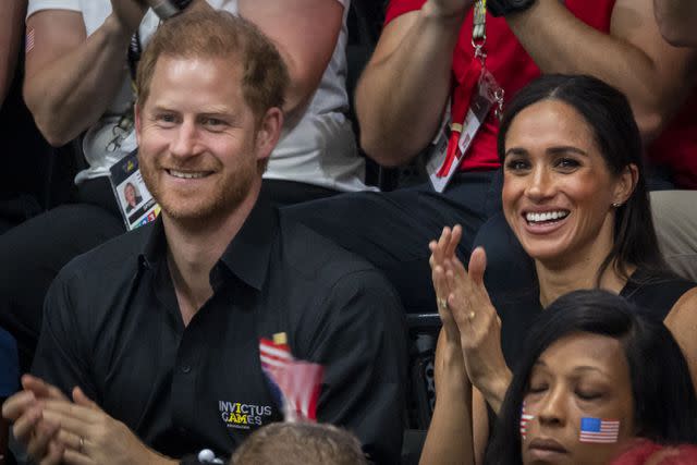 <p>Christoph Reichwein/picture alliance via Getty</p> Prince Harry and Meghan Markle at the Invictus Games in Germany on Sept. 13, 2023