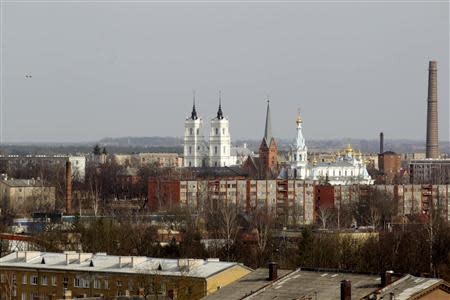 The Roman Catholic Church of the Blessed Virgin Mary (L to R), Martin Luther Cathedral and Saints Boris and Gleb Russian Orthodox Cathedral are seen in Daugavpils March 21, 2014. REUTERS/Ints Kalnins