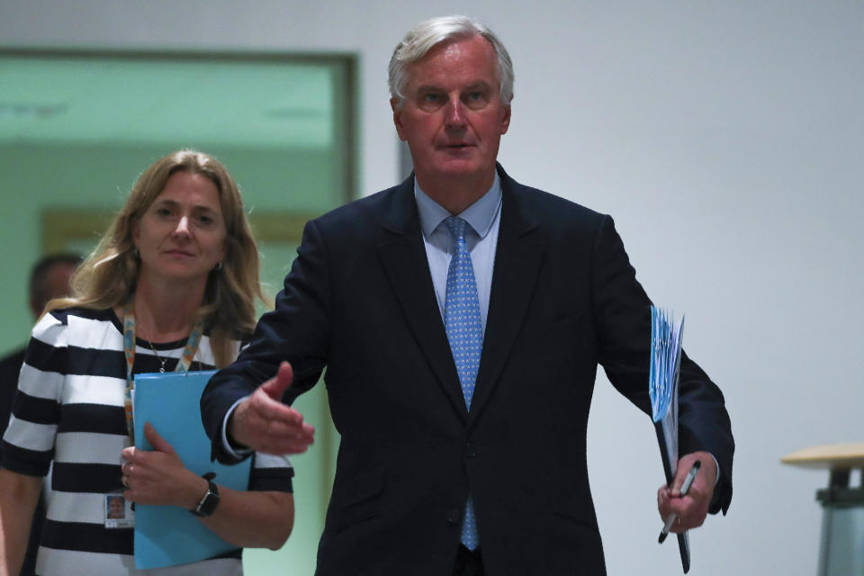 European Union chief Brexit negotiator Michel Barnier arrives to a Brexit Steering Group meeting at the European Parliament in Brussels, Wednesday, Oct. 16, 2019. (AP Photo/Francisco Seco)