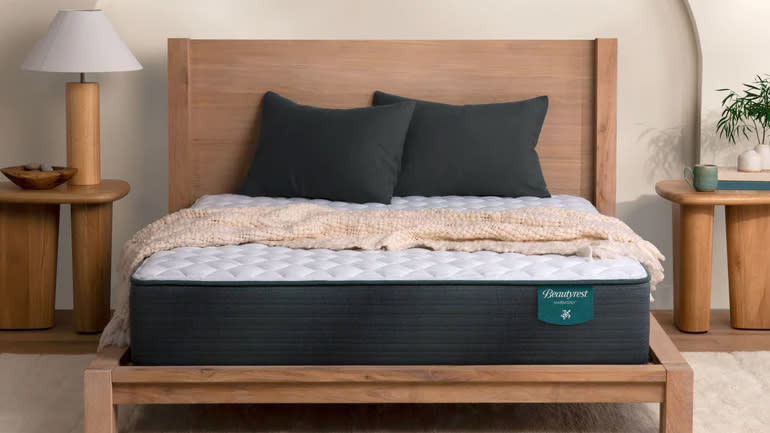  Beautyrest Harmony Mattress on a wooden bed frame in a neutral coloured bedroom. 