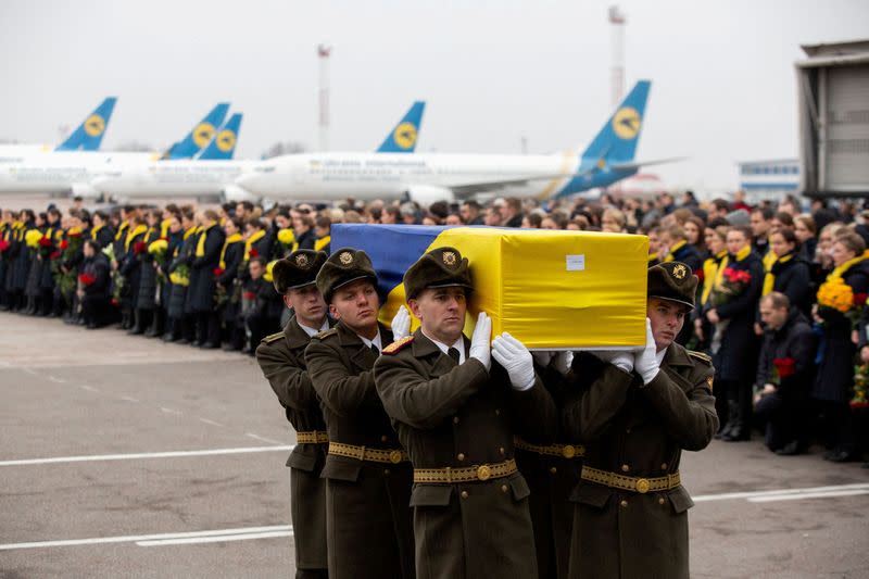FILE PHOTO: Memorial ceremony for the Ukrainian victims of Iran plane crash at the Boryspil International Airport, outside Kiev