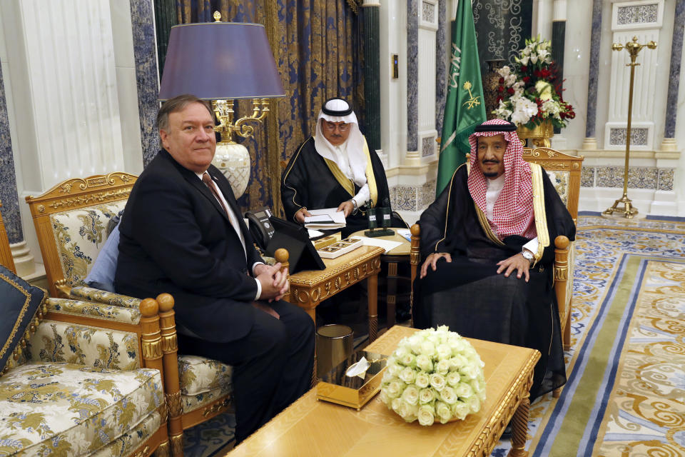 U.S. Secretary of State Mike Pompeo, left, meets with Saudi Arabia's King Salman in Riyadh, Saudi Arabia, Tuesday Oct. 16, 2018. The kingdom of Saudi Arabia has enjoyed the ultimate protected status from the United States throughout its short history. With Pompeo hastily dispatched on a damage-limitation mission to Riyadh, behind-the-scenes efforts are in full flow to preserve the Saudi-U.S. relationship in the wake of the disappearance and alleged killing of Saudi journalist Jamal Khashoggi. (Leah Millis/Pool via AP)