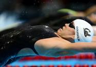 June 26, 2012; Omaha, NE, USA; Natalie Coughlin competes in the semifinal heat of womens 100m backstroke in the 2012 U.S. Olympic swimming team trials at the CenturyLink Center. Mandatory Credit: Andrew Weber-US PRESSWIRE 