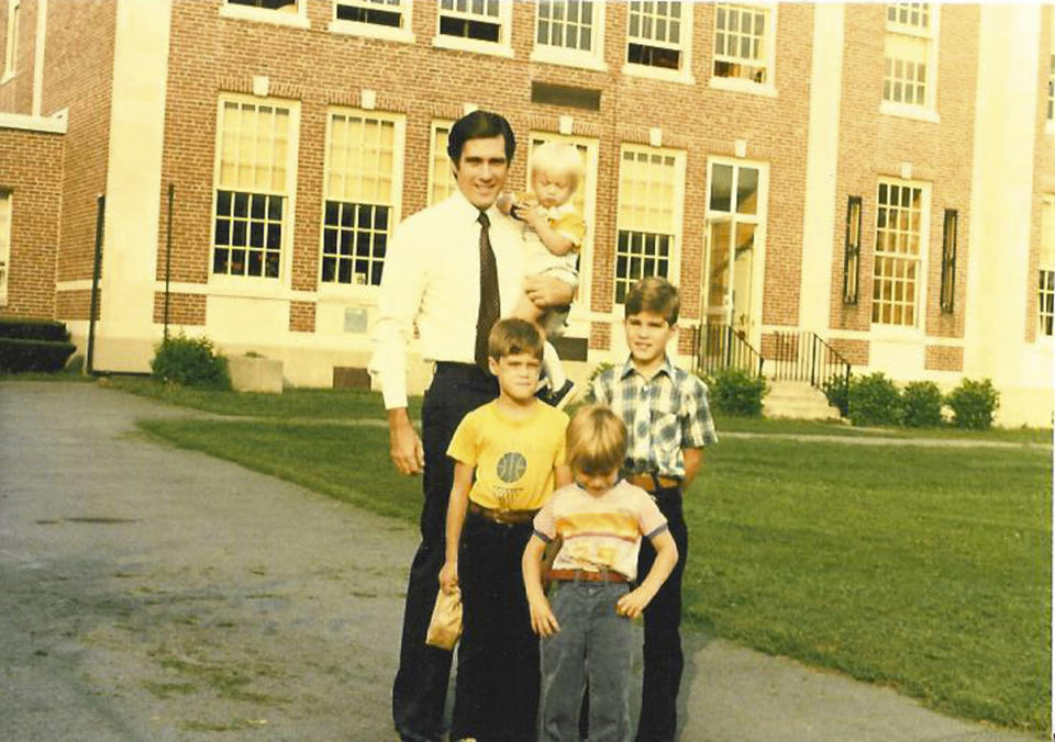 Mitt Romney and his sons in an undated photo. REUTERS/Romney for President