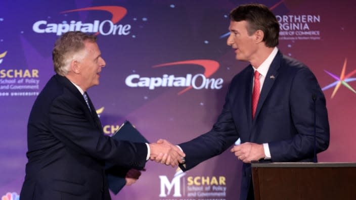 Former Virginia Gov. Terry McAuliffe (left) and Republican gubernatorial candidate Glenn Youngkin (right) shake hands at the conclusion of their final debate last month in Alexandria, Virginia. (Photo: Win McNamee/Getty Images)