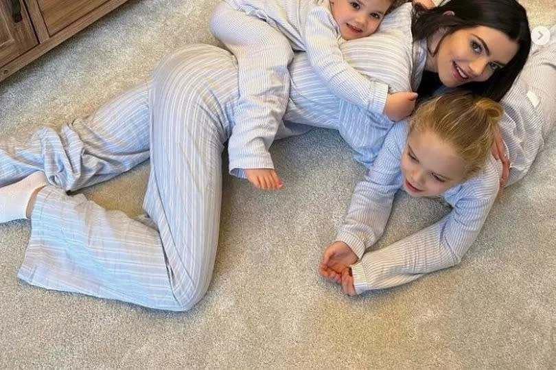 Emma McVey and her daughters