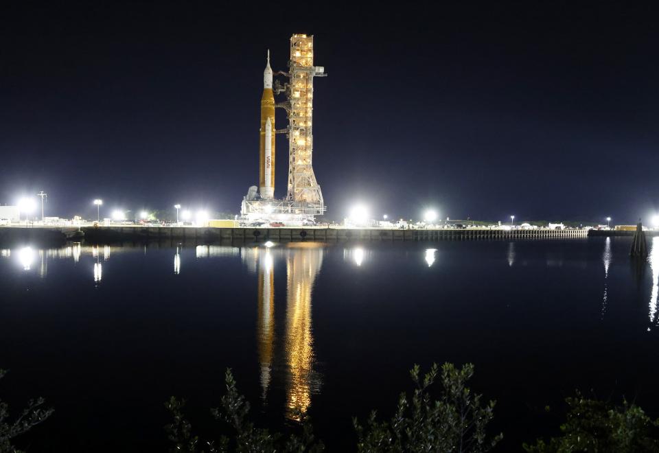 The NASA Artemis rocket with the Orion spacecraft aboard leaves the Vehicle Assembly Building moving slowly to pad 39B at the Kennedy Space Center in Cape Canaveral, Fla., Tuesday, Aug. 16, 2022. NASA is aiming for an Aug. 29 liftoff for the lunar test flight. (AP Photo/Terry Renna)