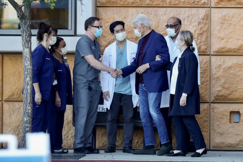 Former U.S. President Bill Clinton leaves University of California Irvine Medical Center, in Orange, California