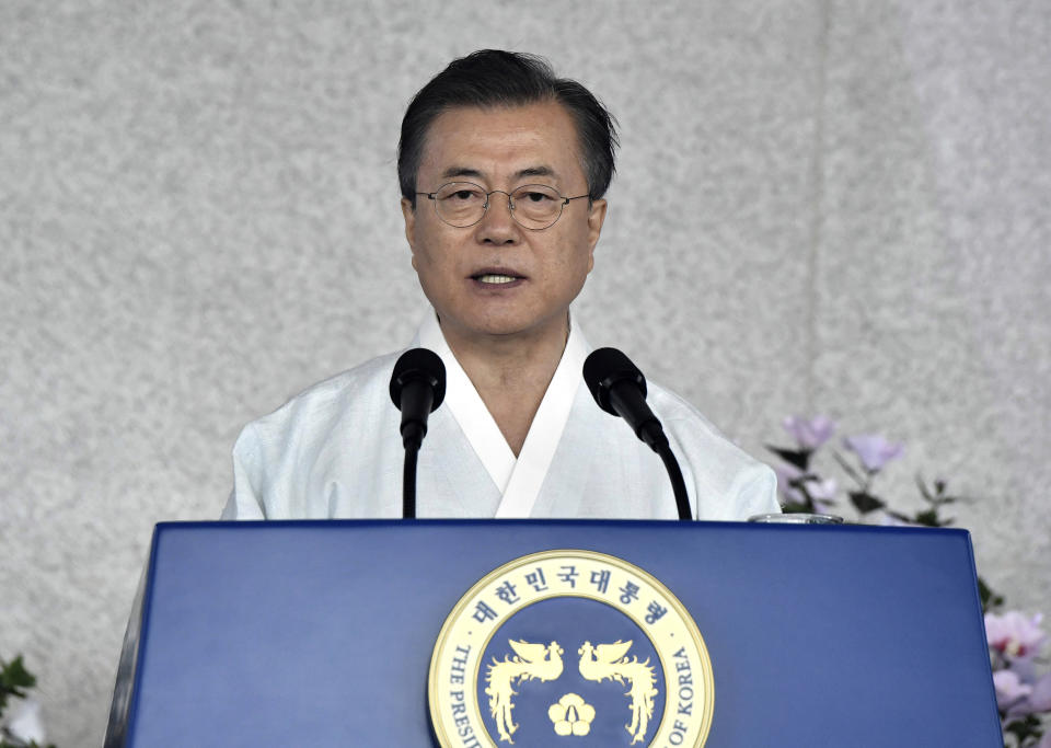 FILE - In this Aug. 15, 2019, file photo, South Korean President Moon Jae-in delivers a speech during a ceremony to mark the 74th anniversary of Korea's liberation from Japanese colonial rule, at the Independence Hall of Korea in Cheonan, South Korea. Weeks after angrily declaring that South Korea will "never again lose" to Japan, Moon on Aug. 15, used the 74th anniversary of Japan’s World War II surrender to extend an olive branch, saying Seoul will "gladly join hands" if Tokyo wants to talk.(Jung Yeon-je /Pool Photo via AP, File)