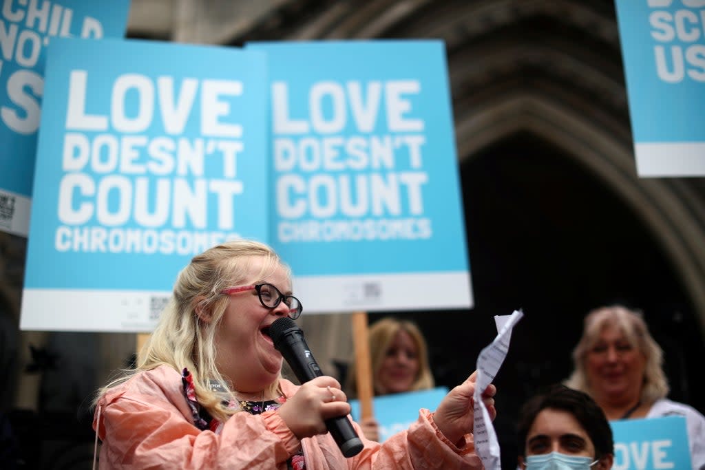 Heidi Crowter speaks outside the High Court in July (REUTERS)