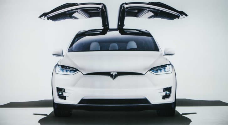 white tesla car (TSLA)