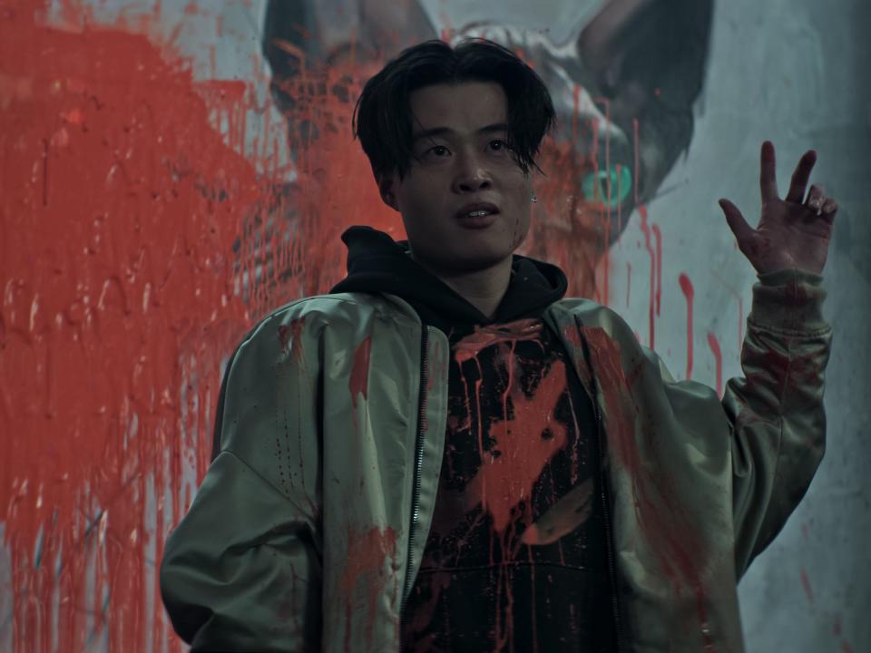 simon soo covered in red paint on season four of you