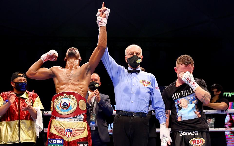 Jamel Herring celebrates as Frampton considers the significance of the loss - GETTY IMAGES