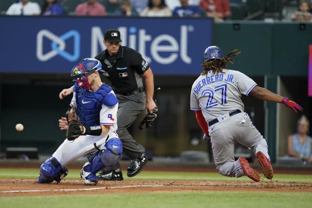 Blue Jays score early and often in 11-7 victory over Rangers