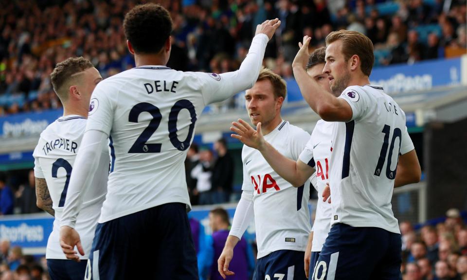 Harry Kane celebrates scoring the third goal against Everton with his Spurs teammates.