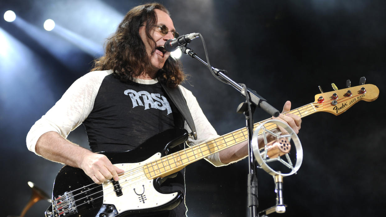  Geddy Lee of Rush performs part of the bands' Time Machine Tour at Sleep Train Pavilion on June 26, 2011 in Concord, California. 