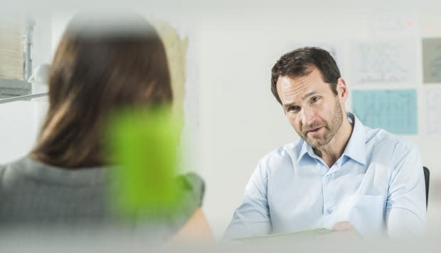 Businessman and woman in office