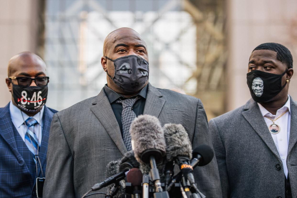 Rodney Floyd, brother of George Floyd, speaks alongside Philonise Floyd, brother of George Floyd (L), and Brandon Williams, nephew of George Floyd (R), during a news conference outside the Hennepin County Government Center on March 29, 2021, in Minneapolis, Minnesota.