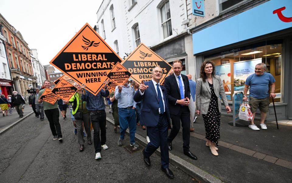 Sir Ed Davey (L) and newly elected MP Richard Foord (C) walk through Tiverton along with Chief Whip Wendy Chamberlain today - Finnbarr Webster /Getty Images Europe