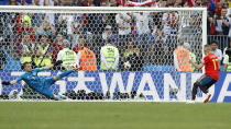 <p>The moment of victory: Russian goalkeeper Igor Akinfeev saves his second penalty in the shootout from Iago Aspas as Russia won 4-3 on penalties </p>