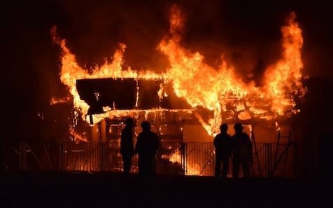 The blaze at Woodmill High School was being fought by more than 80 firefighters - Credit: Scottish Fire and Rescue Service/Twitter