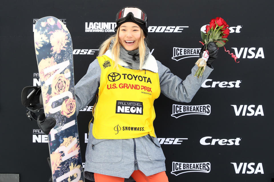 Chloe Kim #1 poses for photographers wearing her FIS points leader's bib after the Ladies Snowboard Halfpipe final during the Toyota U.S. Grand Prix on January 13, 2018 in Snowmass, Colorado.