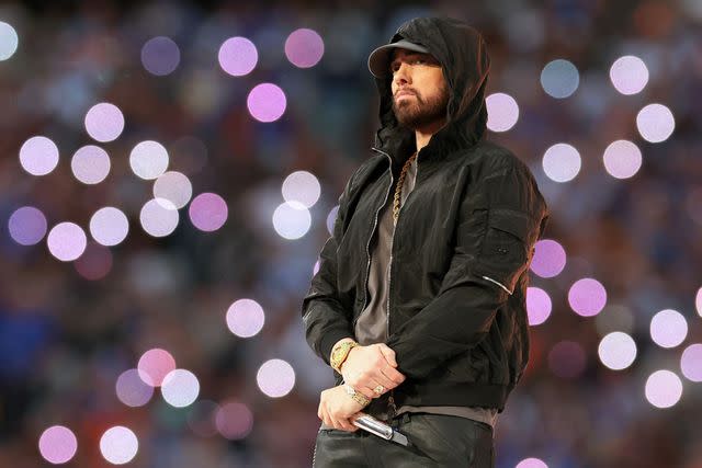 <p> Kevin C. Cox/Getty</p> Eminem performs at SoFi Stadium in February 2022 in Inglewood, California