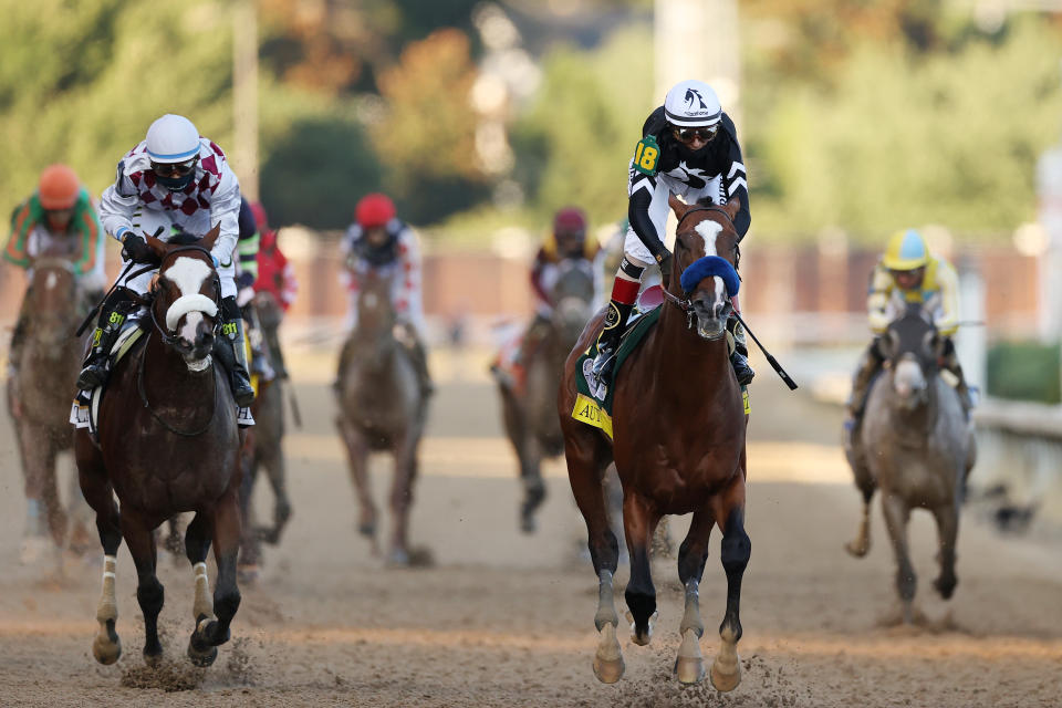 LOUISVILLE, KENTUCKY - SEPTEMBER 05: Jockey John Velazquez aboard Authentic #18, celebrates after winning the 146th running of the Kentucky Derby at Churchill Downs on September 05, 2020 in Louisville, Kentucky. (Photo by Gregory Shamus/Getty Images)