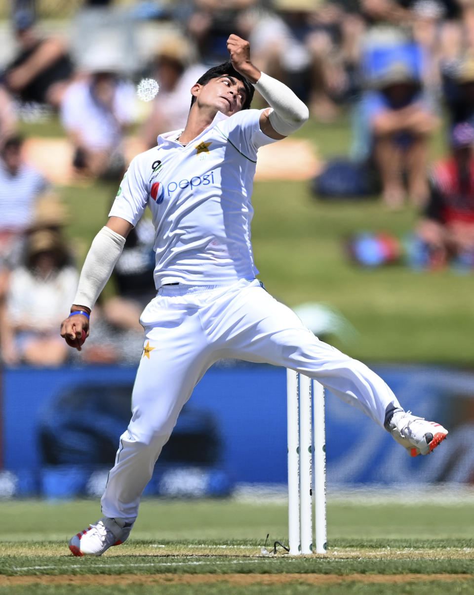Pakistan's Naseem Shah bowls during play on day two of the first cricket test between Pakistan and New Zealand at Bay Oval, Mount Maunganui, New Zealand, Sunday, Dec. 27, 2020. (Andrew Cornaga/Photosport via AP)