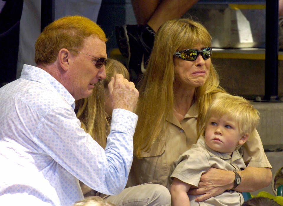 John Stainton comforts Terri and the children at Steve's funeral in 2006. Photo: Getty