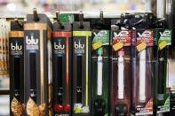 E-cigarettes hang displayed in a tobacco shop in New York, June 23, 2015. REUTERS/Lucas Jackson