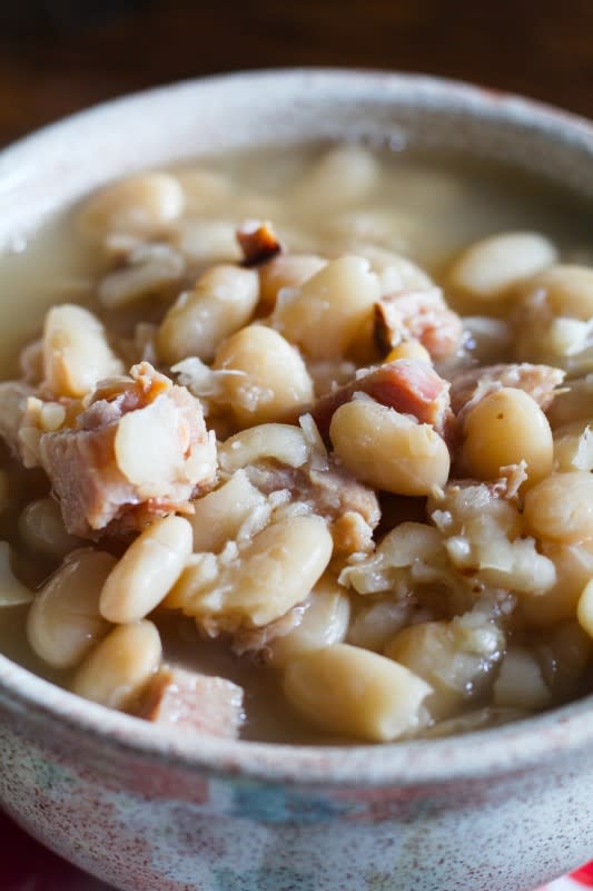 <p>Jen Around the World</p><p>This simple slow cooker white bean and ham stew is a Southern staple — use up leftover holiday ham and dried beans from the pantry! It's a perfect comfort food dinner, especially when served with cornbread.</p><p><strong>Get the Recipe: <a href="https://jenaroundtheworld.com/slow-cooker-southern-style-white-beans-and-ham/" rel="nofollow noopener" target="_blank" data-ylk="slk:Southern White Beans and Ham;elm:context_link;itc:0;sec:content-canvas" class="link rapid-noclick-resp">Southern White Beans and Ham</a></strong></p>