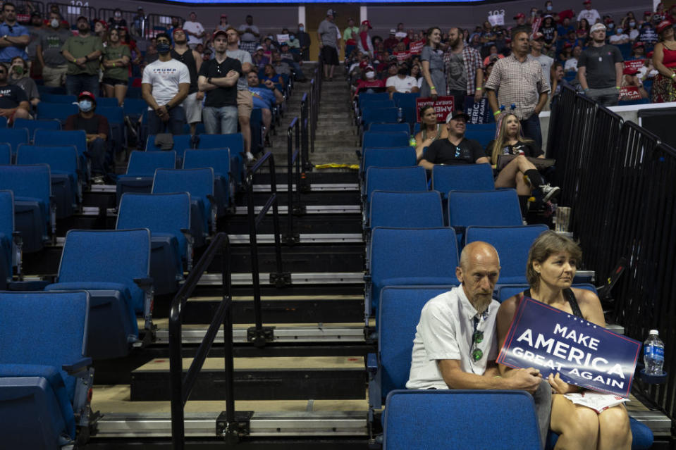 Attendees listen during a rally with President Donald Trump in Tulsa, Oklahoma, on June 20. (Photo:Go Nakamura/Bloomberg)