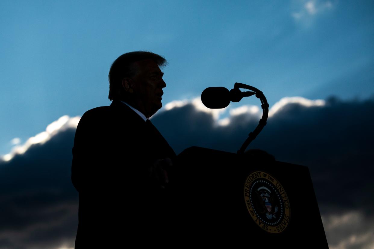 Outgoing President Donald Trump addresses guests at Joint Base Andrews in Maryland on January 20, 2021. - President Trump and the First Lady travel to their Mar-a-Lago golf club residence in Palm Beach, Florida. (Alex Edelman/AFP via Getty Images)