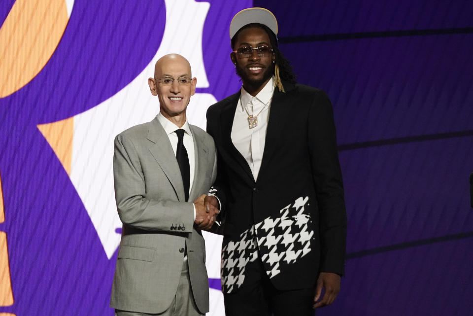 Isaiah Jackson,right, poses for a photo with NBA Commissioner Adam Silver after being selected 22nd overall by the Los Angeles Lakers during the NBA basketball draft, Thursday, July 29, 2021, in New York. - Credit: AP