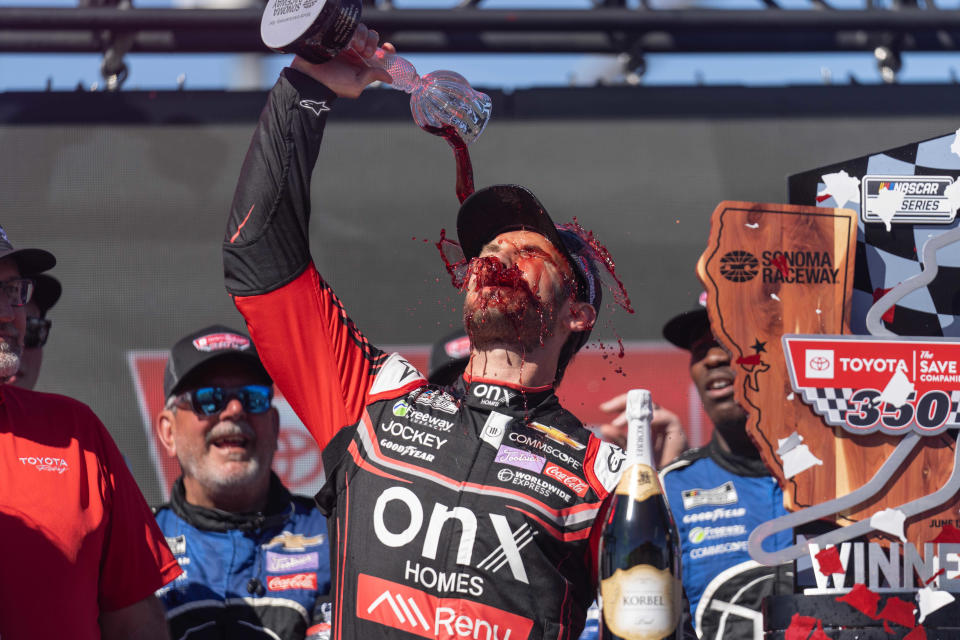 Daniel Suarez celebrates after winning the 2022 Toyota/Save Mart 350 at Sonoma Raceway for his first career NASCAR Cup Series win.