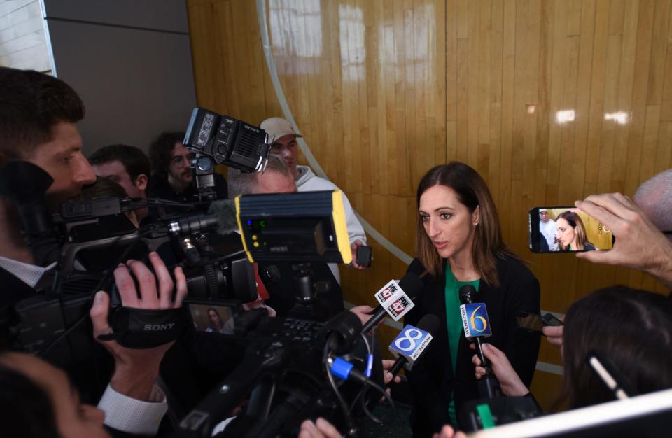 Michigan State University Women's Basketball Coach Robyn Fralick speaks with a scrum of reporters during her first press conference as head coach of the MSU's women's basketball team, Tuesday, April 4, 2023, at the Breslin Center Hall of History in East Lansing.