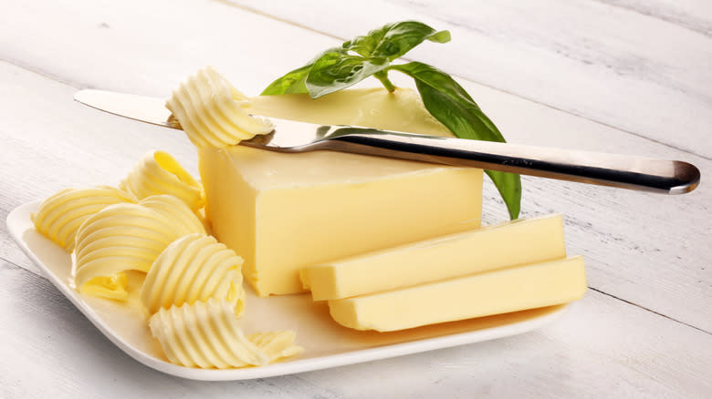 Block of butter with knife