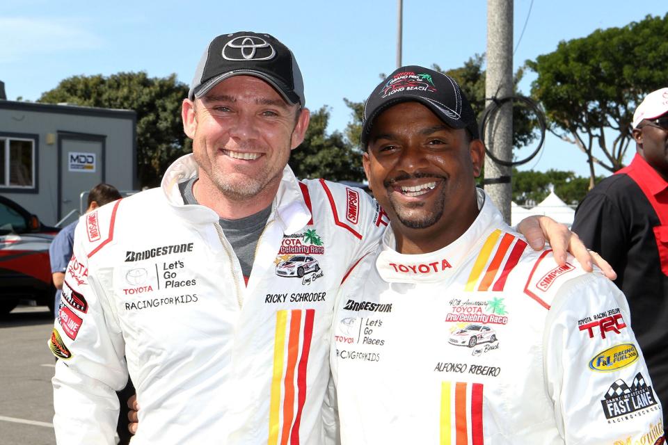 Actors Ricky Schroder and Alfonso Ribeiro attend the 42nd Toyota Grand Prix of Long Beach Press Day