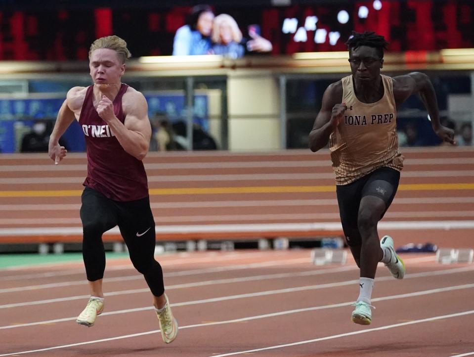 O'Neill's Jadon Spain and Iona Prep's Marcus Hahim run the 55-meter dash at the Millrose Trials at The Armory in New York on Wednesday, January 11, 2023.