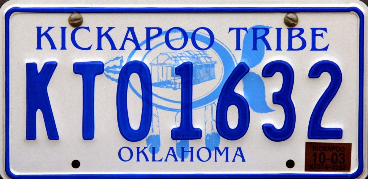 oklahoma tags page: Kickapoo Tribe plate, found in Stillwater. shot on wed. 30 apr. 2003. Photo by robert s. cross