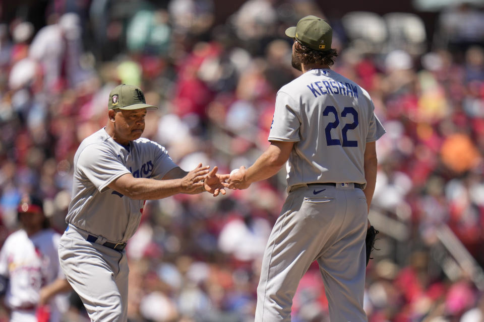 Los Angeles Dodgers starting pitcher Clayton Kershaw (22) is removed by manager Dave Roberts during the fourth inning of a baseball game against the St. Louis Cardinals Sunday, May 21, 2023, in St. Louis. (AP Photo/Jeff Roberson)