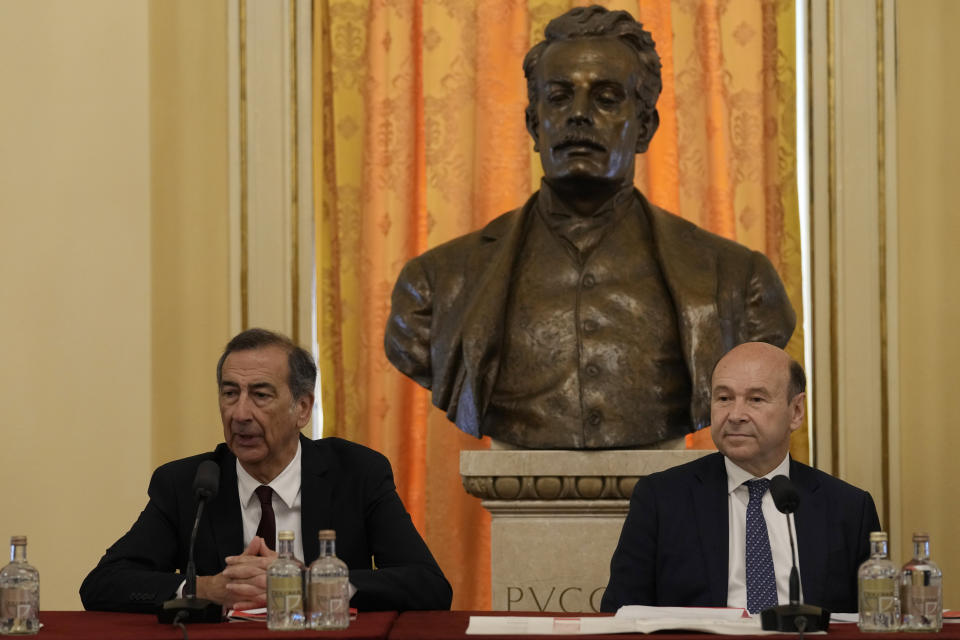 Milan's mayor Giuseppe Sala, left, and La Scala general manager Dominique Meyer attend at a press conference to present the 2023/2024 season, at Milan's La Scala opera house, Italy, Monday, May 29, 2023. (AP Photo/Antonio Calanni)