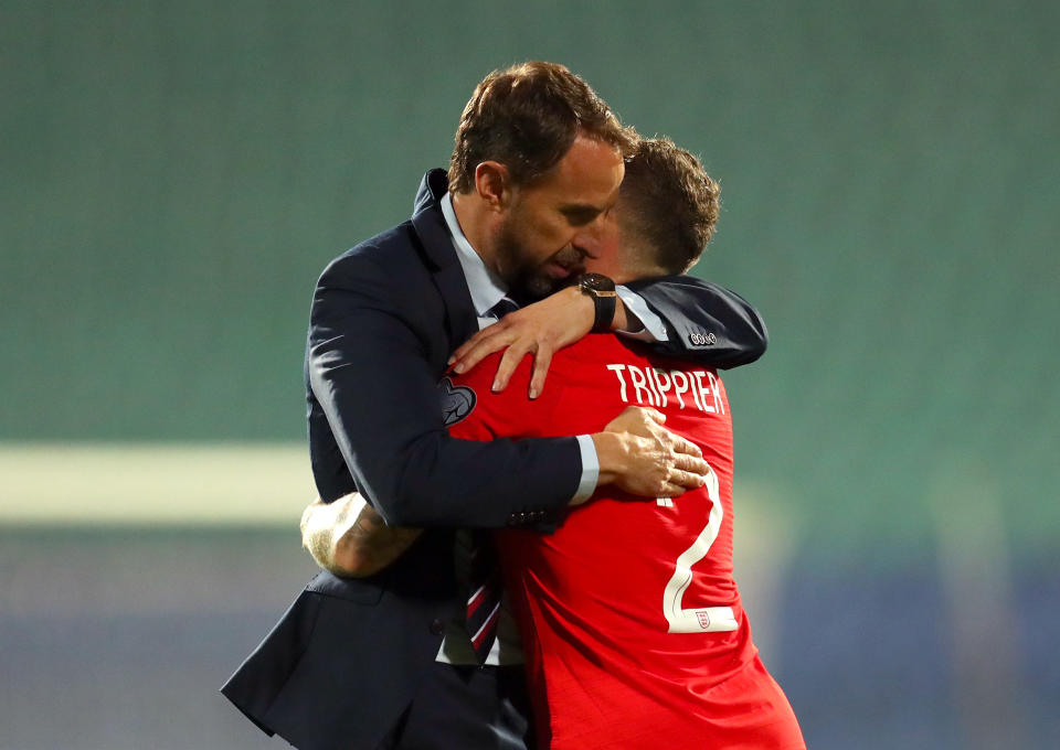 SOFIA, BULGARIA - OCTOBER 14: Gareth Southgate, Manager of England and Kieran Trippier of England embrace during the UEFA Euro 2020 qualifier between Bulgaria and England on October 14, 2019 in Sofia, Bulgaria. (Photo by Catherine Ivill/Getty Images)
