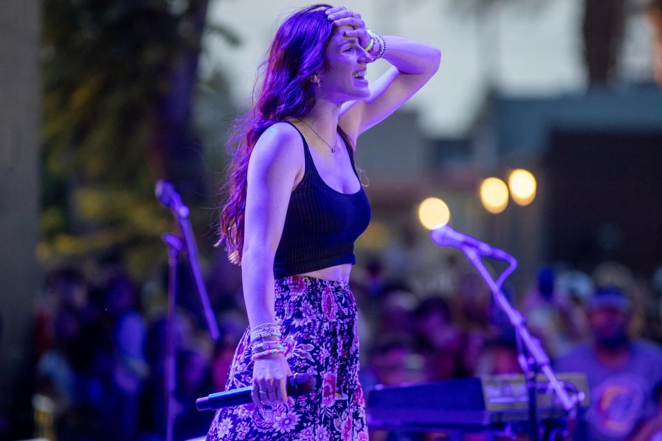 Indio native and “American Idol” finalist Abi Carter reacts as she looks out at the crowd during her performance on Center Stage in downtown Indio, Calif., on Tuesday, May 14, 2024.