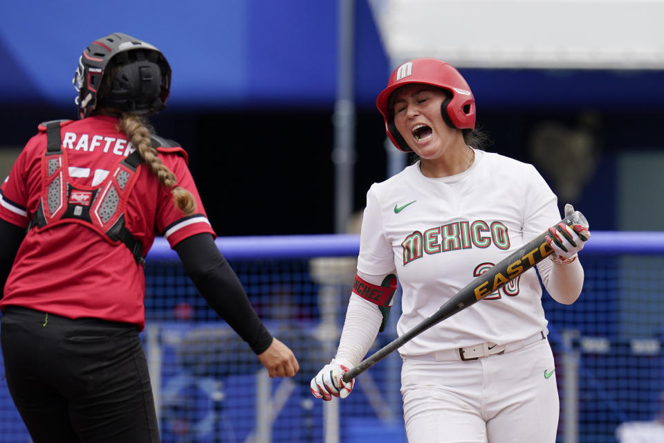 Mexico's Amanda Sanchez reacts after hitting a foul ball during a softball game against Canada at the 2020 Summer Olympics, Tuesday, July 27, 2021, in Yokohama, Japan (AP Photo/Sue Ogrocki)
